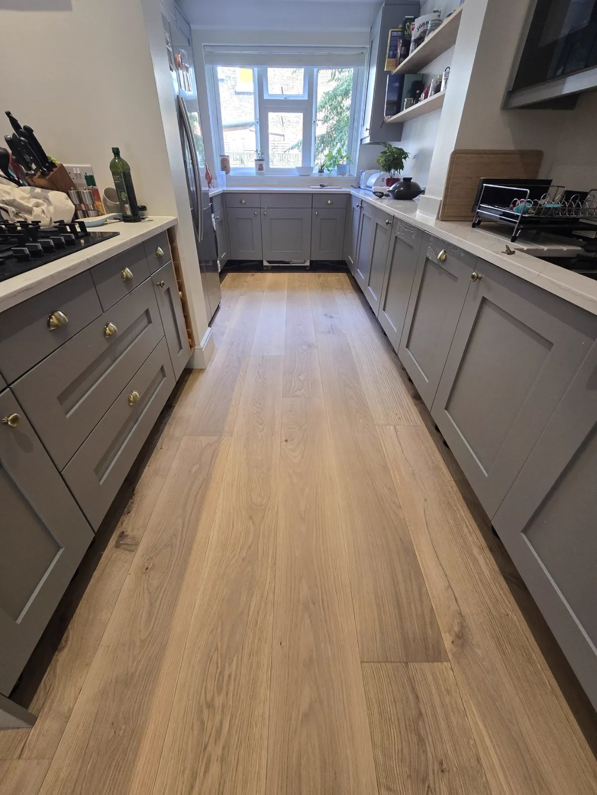 Refinished oak plank floor in a Clapham SW4 kitchen