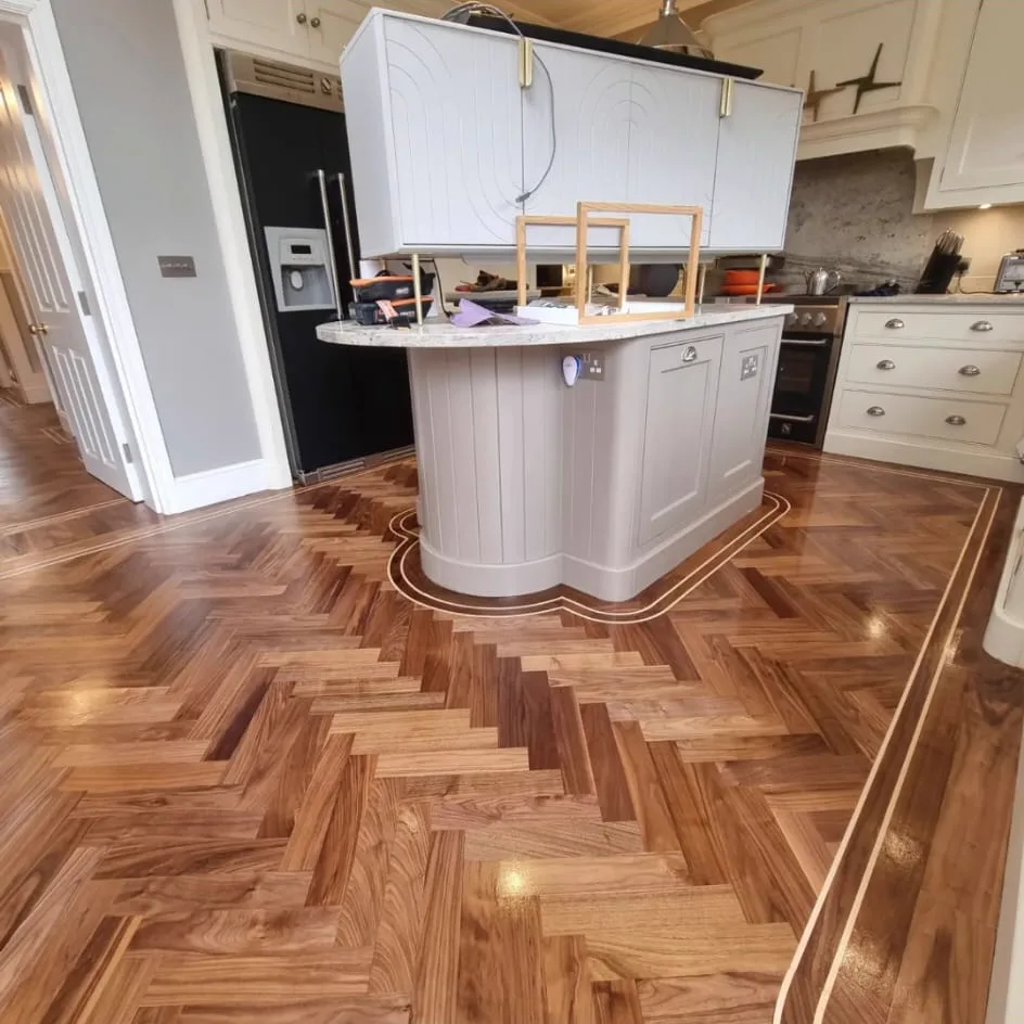 Walnut herringbone with inlay border