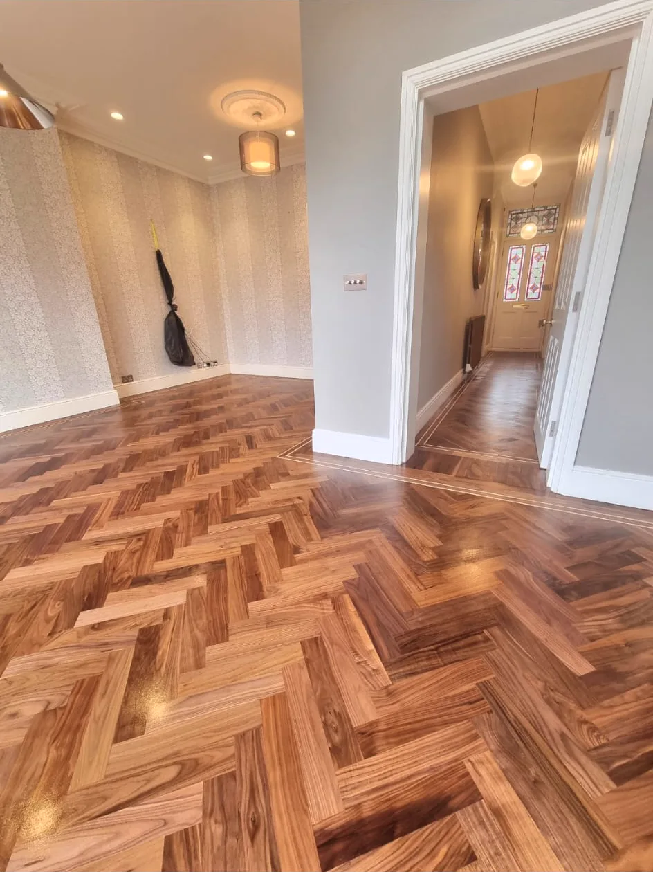 Walnut herringbone reception to hallway
