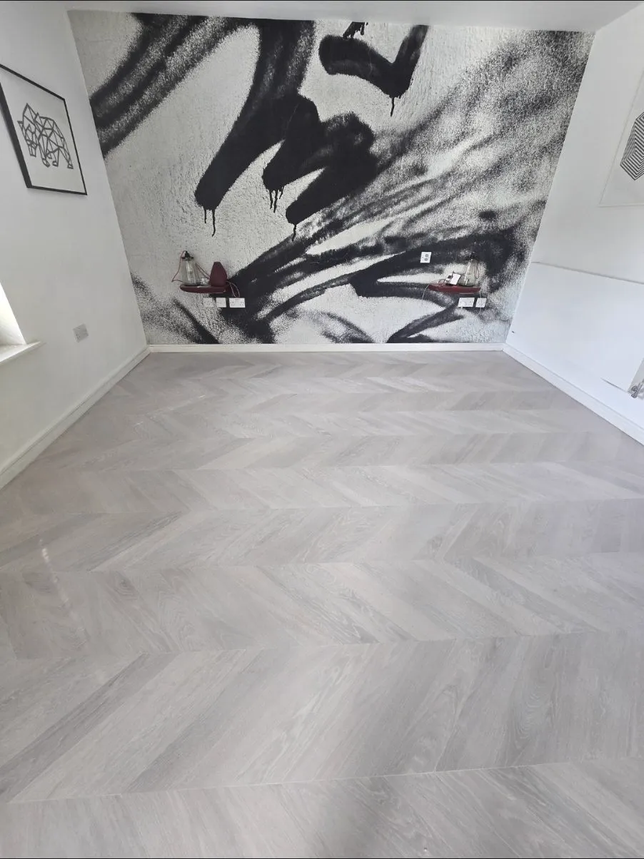 Pale grey-white oak chevron floor