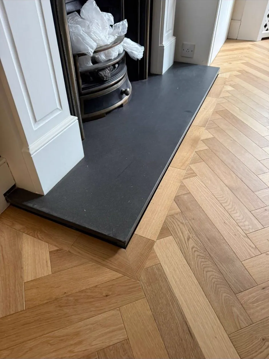 Herringbone parquet scribed to a slate hearth in Wimbledon SW19