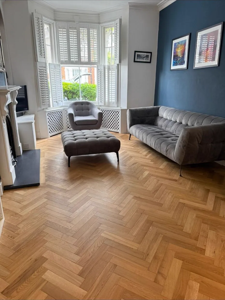 Herringbone oak parquet installation in a Wimbledon SW19 living room